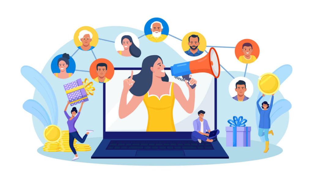 Illustration of a woman inside a laptop holding a megaphone, surrounded by smiling people, some holding gifts, showcasing the power of influencer partnerships for social media app marketing.