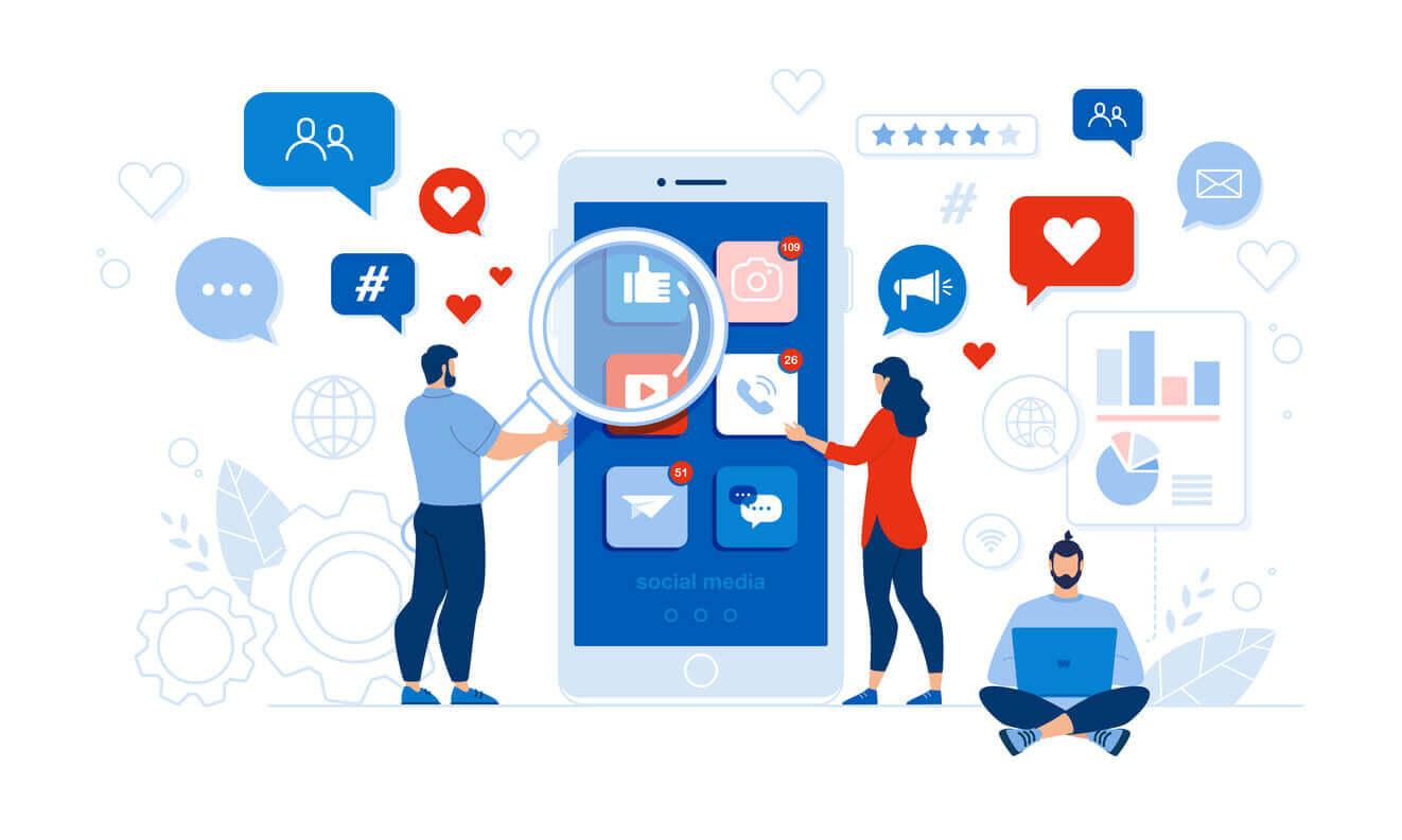 Image showing two people looking at a phone filled with various apps, surrounded by graphs and emojis, including love hearts and hashtags, illustrating the intricacies of social media app marketing. A third person is sitting on the floor cross-legged with a laptop.