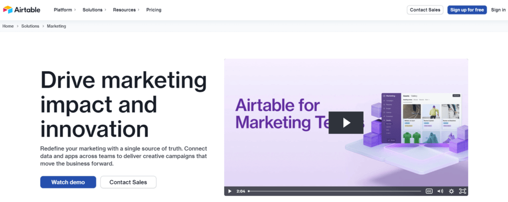 Screenshot from the Airtable homepage showing the main menu, a blurb about the marketing tool, and an informational video about the software.